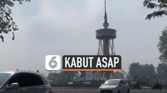 Hujan sempat mengguyur Jambi di tengah kabut asap. Langit yang tadinya diselimuti asap mulai kembali normal dengan jarak pandang yang lebih baik.