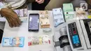 Diketahui, Bank Indonesia telah membuka layanan pemesanan penukaran uang baru periode I dan II melalui PINTAR BI sejak awal Maret 2025 lalu. (Liputan6.com/Angga Yuniar)