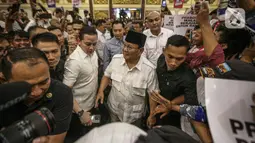 Kedatangan menteri pertahanan disambut teriakan heboh dari para pendukungnya. (Liputan6.com/Faizal Fanani)