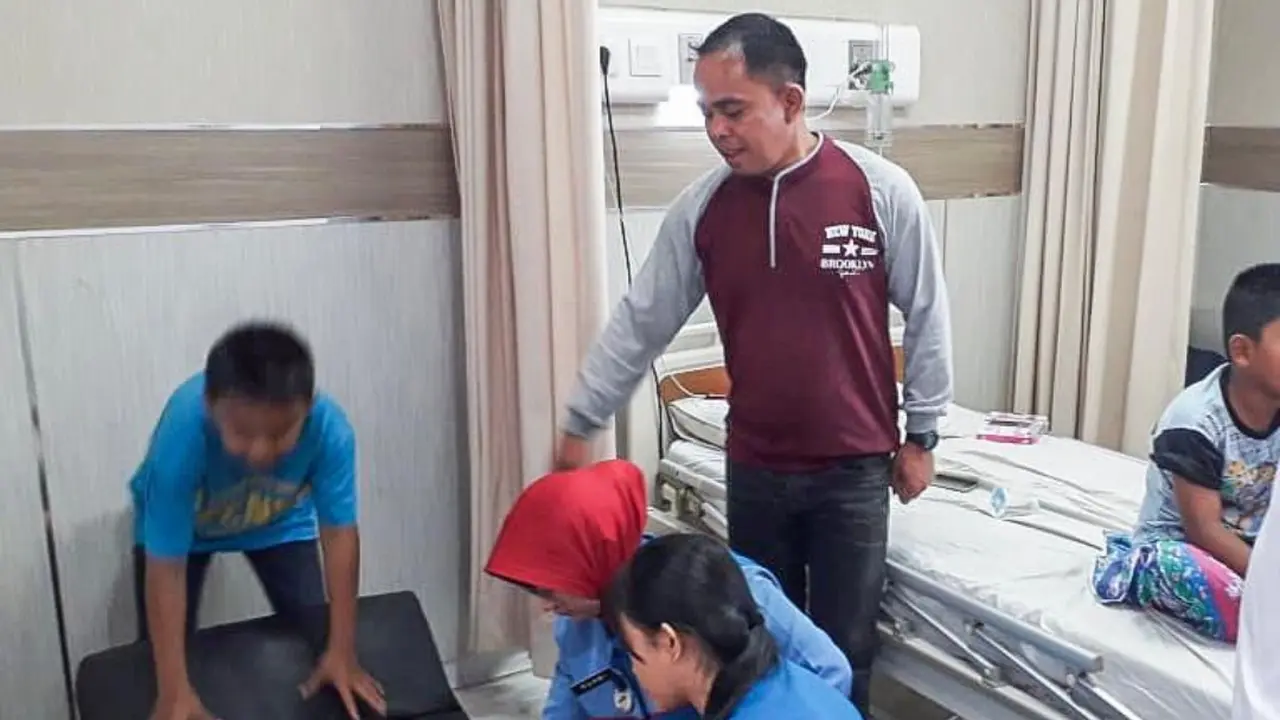 EAB, bocah dua tahun yang menjaga jenazah ibundanya (Fauzan/Liputan6.com)