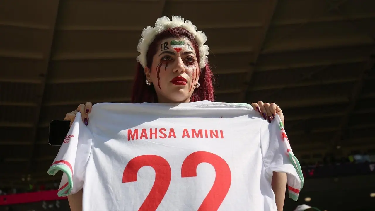 An Iran supporter paid tribute to 22-year-old Mahsa Amini during today's World Cup game against Wales.