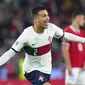 Bek Timnas Portugal, Diogo Dalot merayakan gol ke gawang Republik Ceska di ajang UEFA Nations League. (AP Photo/Petr David Josek)