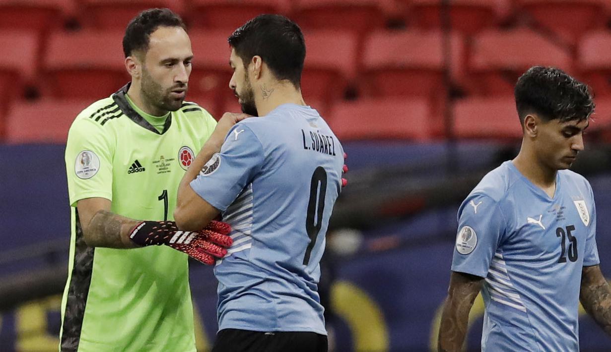 Pada laga yang digelar di Estadio Nacional de Brasilia tersebut Luis Suarez dan kawan-kawan menyerah dalam adu penalti dengan skor 4-2. (Foto:AP/Bruna Prado)