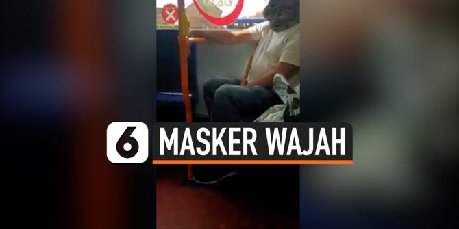 VIDEO:Pria Gunakan Ular Piton Sebagai Masker Saat Bepergian