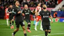 Baru pada menit ke-63, lewat titik putih, pemain Liverpool Mohamed Salah berhasil mencetak gol ke gawang Girona. Gol ini menjadi penentu kemenangan Liverpool atas Girona. (Josep LAGO/AFP)