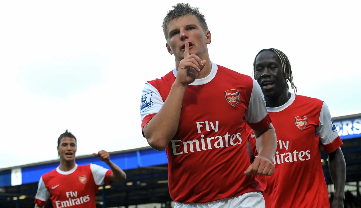 Arsenal pun merekrutnya dari Zenit St Petersburg pada 3 Februari 2009 dengan nilai 15 juta pound meski ada kesan keterlambatan transfer. Tampil hingga tengah musim 2012/2013, ia tampil 144 laga dengan torehan 31 gol dan 46 assist. Ia pensiun pada Januari 2019 bersama Zenit. (AFP/Andrew Yates)