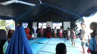 Anak-anak koban gempa dan tsunami di Palu menjalani  psikososial di Dinsos Palu (Liputan6.com/Moch Harun)