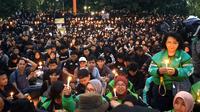 Aksi solidaritas dan menuntut keadilan untuk pengemudi ojol Affan Kurniawan di Alun-alun Malang pada Jumat (29/8/2025). (Liputan6.com/Zainul Arifin)
