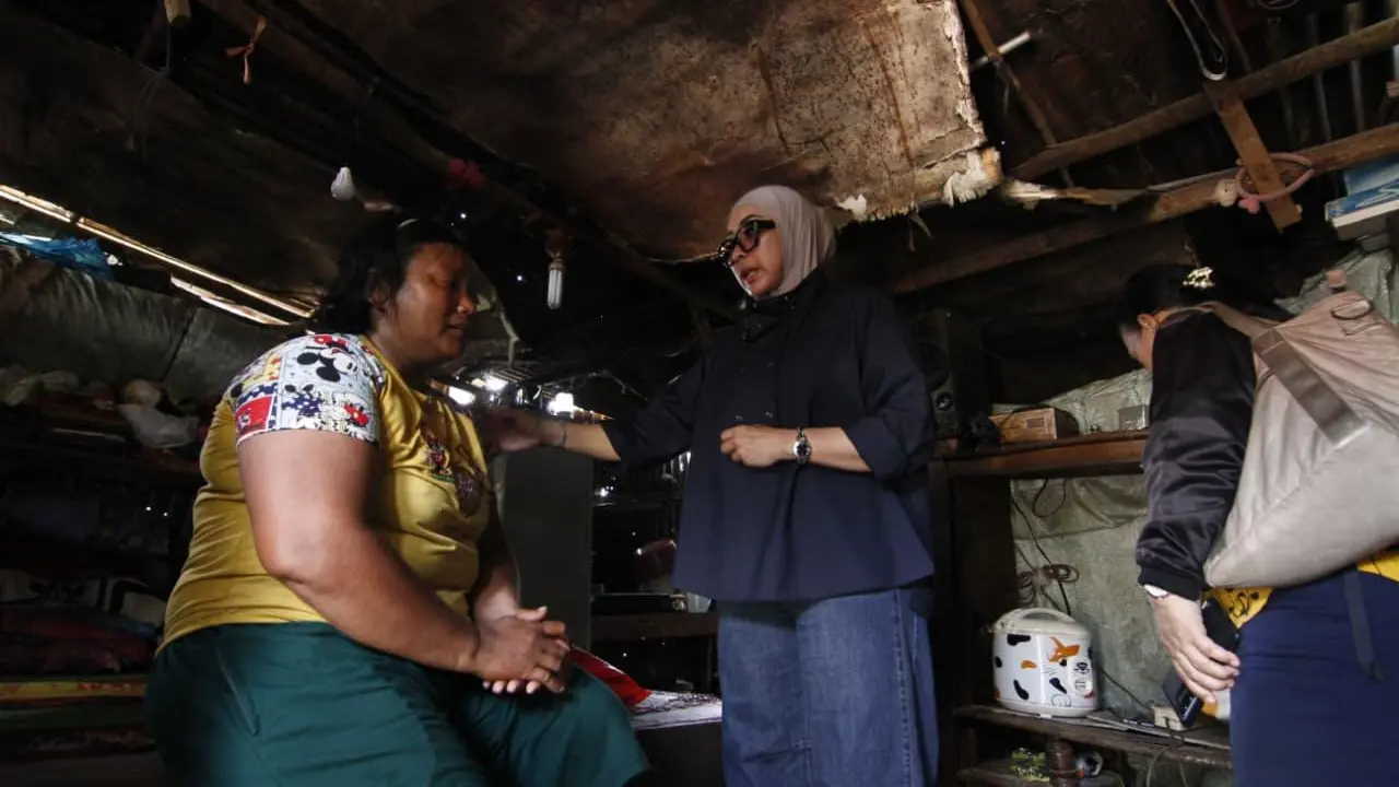 Anggota DPR Dapil Riau I Dewi Juliani menghadiri penyaluran Program Bantuan Stimulan Perumahan Swadaya (BSPS) di Kelurahan Palas, Kecamatan Rumbai, Pekanbaru, Selasa (28/4) (Istimewa)