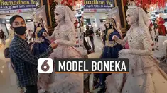 Model boneka manekin sebuah usaha wedding ini membuat bingung.
