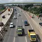 Sejumlah kendaraan melaju di ruas Tol Jakarta Outer Ring Road (JORR), Jakarta, Rabu (21/2). Pemerintah berencana mengintegrasi empat ruas Tol JORR. (Liputan6.com/Angga Yuniar)