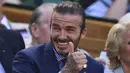 David Beckham tampak bahagia usai petenis Britania Raya, Andy Murray berhasil mengalahkan petenis Italia, Fabio Fognini pada turnamen tenis Wimbledon di London, Inggris. (AFP/Glyn Kirk)