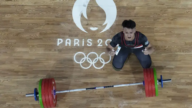 Foto: Pecahkan Rekor Olimpiade, Rizki Juniansyah Sumbang Emas Kedua Indonesia di Olimpiade Paris 2024