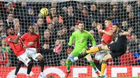 Manchester United harus puas bermain 0-0 kontra Wolverhampton Wanderers pada laga pekan ke-25 Premier League di Old Trafford, Sabtu (1/2/2020). (AFP/Lindsey Parnaby)