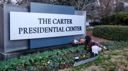 Mantan Presiden Amerika Serikat, Jimmy Carter meninggal dunia di usia 100 tahun di kediamannya di Plains, Georgia pada Minggu 29 Desember 2024. (Alex Wroblewski/AFP)