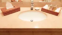 Ilustrasi seperangkat alat mandi hotel. (iStockphoto)