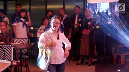 Anak-anak berbakat disabilitas membawakan karya seni pada perayaan 50 tahun Plan International Indonesia di Jakarta, Jumat (20/9/2019). Desain kolaborasi yang mengangkat tema kesetaraan anak-anak perempuan dibawakan oleh anak-anak disabilitas dari Glowing Star. (Liputan6.com/Fery Pradolo)