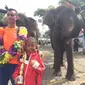 Hawila Sabat Intan Sari, 8 tahun, menjadi peserta perempuan pertama yang berhasil mencapai garis finis ajang lari 5 km "Safari Run 2016".