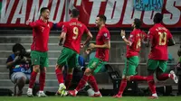 Cristiano Ronaldo berhasil mengukir hattrick saat Timnas Portugal menang 5-0 atas Luksemburg pada laga ketujuh kualifikasi Piala Dunia 2022 zona Eropa di Estadio Algarve, Faro/Loule, Rabu (13/10/2021) pagi WIB. (AFP/Carlos Costa)