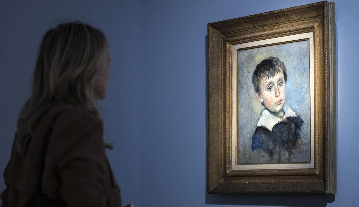 Lukisan yang menggambarkan seorang anak yang berjudul 'Portrait of Jean Monet' ditampilkan dalam pameran 'Monet. Capolavori dal Musee Marmottan' di Roma, Italia (18/10). (Angelo Carconi / ANSA via AP)