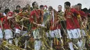 Gelandang Manchester United, Cristiano Ronaldo, bersama rekan-rekannya merayakan gelar Liga Champions usai mengalahkan Chelsea di Stadion Luzhniki, Moskow, Rabu (21/5/2008). (AFP/Franck Fife)