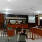 Sidang lanjutan Bupati Bengkalis Amril Mukminin yang digelar secara daring di Pengadilan Tipikor Pekanbaru. (Liputan6.com/M Syukur)