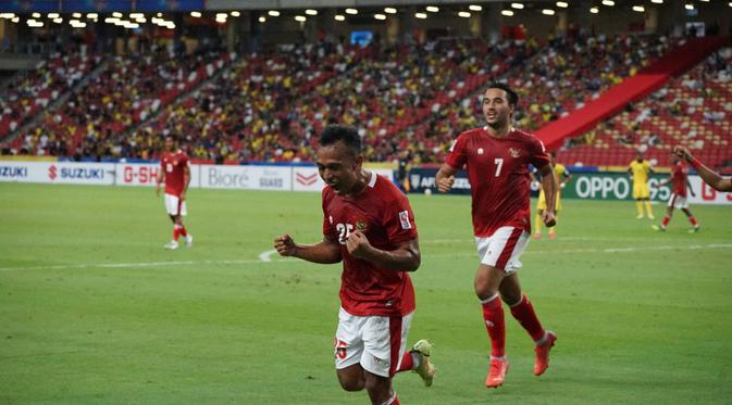 Selebrasi gol yang dilakukan Irfan Jaya dalam laga Timnas Indonesia kontra Malaysia pada laga terakhir Grup B Piala AFF 2020 yang digelar di National Stadium, Kallang, Singapura, Minggu (19/12/2021). (Dok. PSSI)