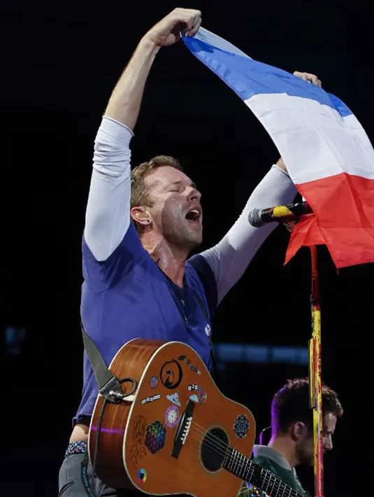 “Jika sempat, lihatlah penampilan Coldplay secara live. Lakukan itu, kalau tidak kamu akan menyesalinya,” pungkas Jay Z. (AFP/Geoffroy Van Der Hasselt)