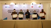 Penandatanganan penyelesaian hunian Program Sejuta Rumah di tiga lokasi Hunian TOD Perum Perumnas. Foto: Perumnas