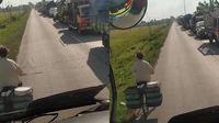 Sopir truk mengikuti pesepeda dari belakang (TikTok/@badahong_24)