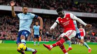 Arsenal harus puas bermain imbang 1-1 kontra Brentford pada laga pekan ke-23 Premier League di Stadion Emirates, Sabtu (11/2/2023) malam WIB. (AP Photo/Frank Augstein)