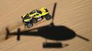Pembalap kategori Mini, Yasir Seaidan dari Arab Saudi dan co-driver Alexey Kuzmich dari Rusia bersaing selama Stage 1A Reli Dakar 2022 antara Jeddah dan Hail, pada 1 Januari 2022. (AFP/Franck Fife)