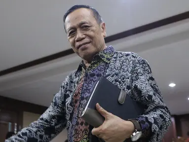 Mantan anggota Komisi XI DPR RI dari Fraksi Partai Demokrat, Amin Santono usai menjalani sidang perdana di Pengadilan Tipikor, Jakarta, Kamis (20/9). Sidang beragendakan pembacaan dakwaan dari JPU KPK. (Liputan6.com/Helmi Fithriansyah)
