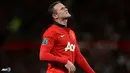 Ekspresi Wayne Rooney pada pertandingan Liga Inggris antara Manchester United melawan Chelsea di Stadion Old Trafford, Manchester Selasa 27 Agustus 2013. (AFP/Andrew Yates)