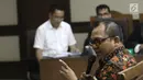 Sekretaris DPD Golkar Basri Baco bersaksi untuk terdakwa mantan anggota Komisi I DPR Fayakhun Andriadi dalam sidang dugaan suap Bakamla di Pengadilan Tipikor, Jakarta, Rabu (12/9). (Liputan6.com/Herman Zakharia)
