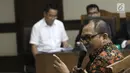 Sekretaris DPD Golkar Basri Baco bersaksi untuk terdakwa mantan anggota Komisi I DPR Fayakhun Andriadi dalam sidang dugaan suap Bakamla di Pengadilan Tipikor, Jakarta, Rabu (12/9). (Liputan6.com/Herman Zakharia)