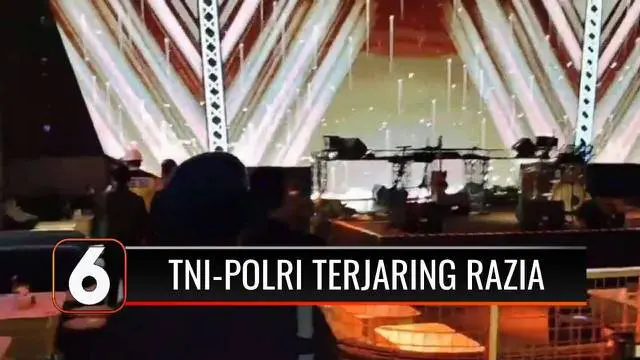 Petugas gabungan TNI-Polri menggelar razia di sejumlah tempat hiburan malam di Bandung, Jawa Barat. Dalam razia ini petugas mendapati belasan anggota TNI-Polri berada di tempat hiburan malam.