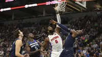 Aksi Andre Drummond saat Pistons Kalahkan Timberwolves (AP)