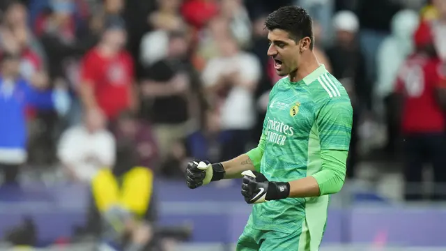 Foto: Gol Tunggal Vinicius Junior dan Apiknya Penampilan Thibaut Courtois Bawa Real Madrid Juara Liga Champions Musim 2021 / 2022
