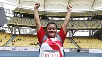 Atlet tolak peluru asal Indonesia, Suparni, memecahkan rekor Asia pada perhelatan ASEAN Para Games 2017 di Kuala Lumpur, Malaysia, Rabu (20/9/2017). (dok. APG Indonesia)
