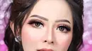 Selain gaunnya, makeup ngunduh mantu Bella Bonita juga sukses mencuri atensi netizen di media sosial. [Instagram/khadijahazzahra_makeup]