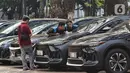 Pemerintah menyediakan mobil listrik atau sering disebut electric vehicle (EV) untuk mengurangi polusi udara. (Liputan6.com/Angga Yuniar)