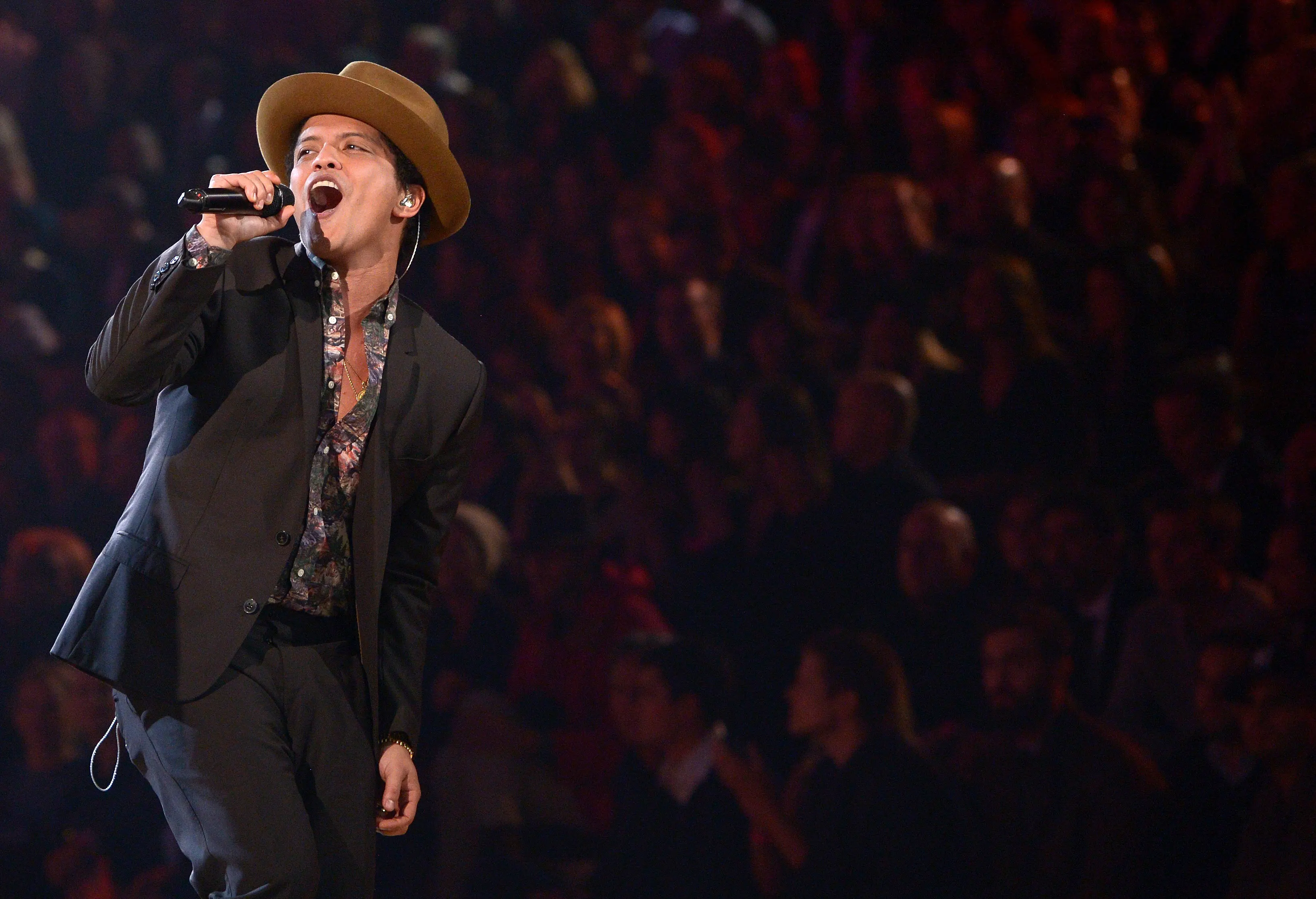 Selain ‘Uptown Funk’, lagu-lagu Bruno Mars sebelumnya memang selalu jadi hits di telinga para penggemarnya. (Bintang/EPA)