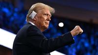 Sebelumnya, mantan Presiden dan kandidat calon Presiden Amerika Serikat dari Partai Republik, Donald Trump menjadi sasaran penembakan saat berkampanye di Pennsylvania pada Sabtu (13/7/2024) lalu. (Jim WATSON/AFP)