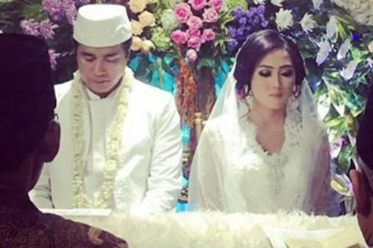 Adjie Pangestu dan Novita Petria