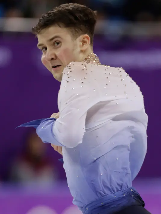 Ekspresi atlet figure skating dari Uzbekistan, Misha Ge saat berlaga di final Olimpiade Musim Dingin 2018 di Gangneung Ice Arena, Korea Selatan (17/2). (AP Photo / David J. Phillip)