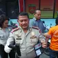 Anggota BIN gadungan dan barang bukti (Liputan6.com/Okan Firdaus)