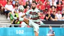 Bruno Fernandes. Gelandang Timnas Portugal ini baru berpartisipasi dalam satu edisi Piala Dunia, yaitu Piala Dunia 2018 di Rusia. Ia hanya tampil dua kali dan belum mencetak satu gol pun. (AFP/Pool/Attila Kisbenedek)