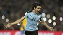Pemain Uruguay, Edinson Cavani saat ini memimpin top scorer sementara babak kualifikasi zona CONMEBOL dengan sembilan gol. (AP/Natacha Pisarenko)