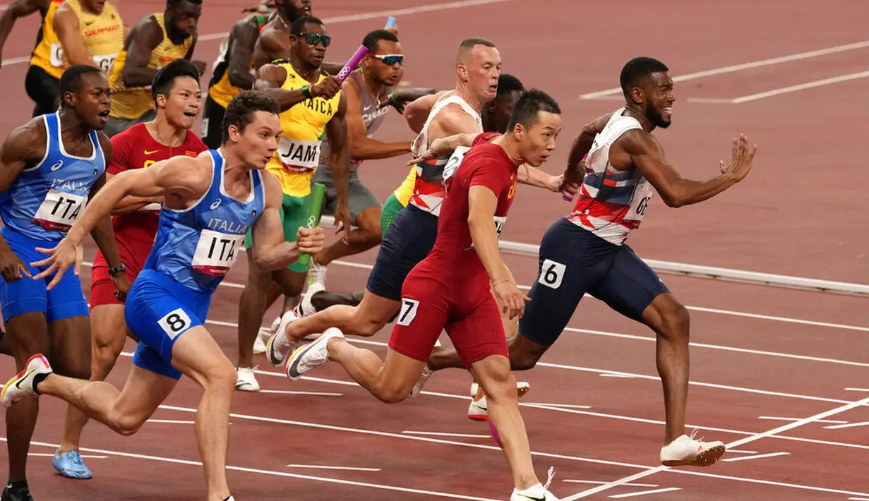 Italia lolos ke babak final usai menempati urutan keempat di sesi kualifikasi dengan catatan waktu 37,95 detik, di bawah Jamaika, Kanada, dan China. (Foto: AP/Martin Meissner)